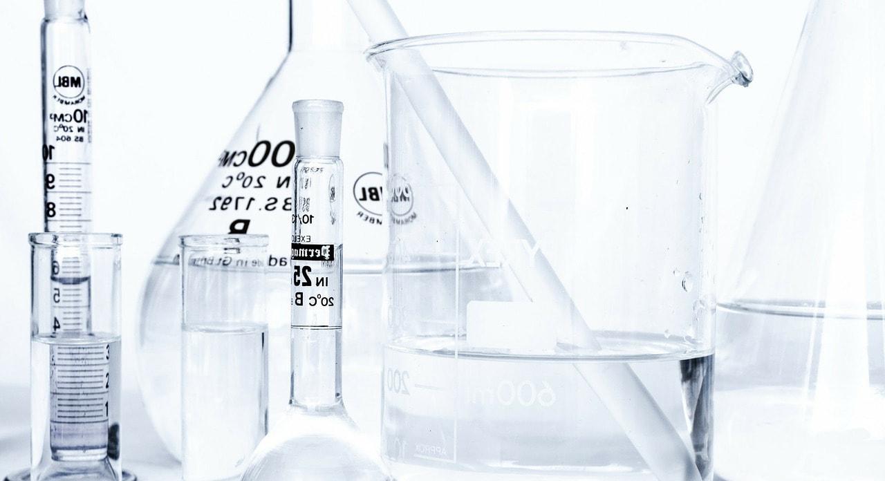 Photo of chemistry equipment (vials, beakers, other glass containers)